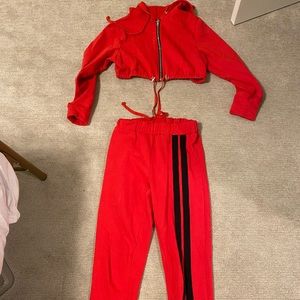 Danielle Guizio red track suit